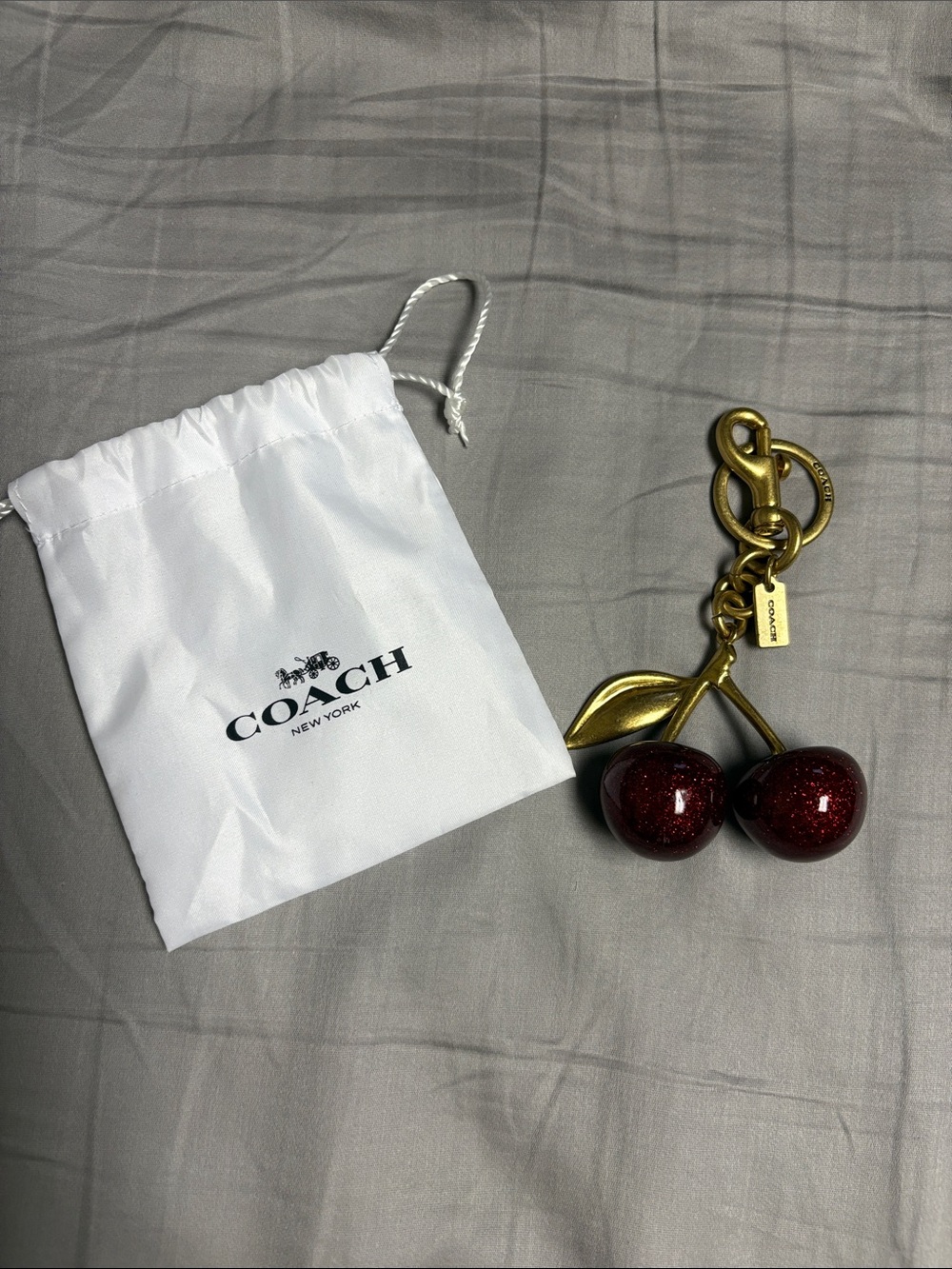 Coach Gold-Tone Cherry Bag Charm with Deep Red Enamel Cherries